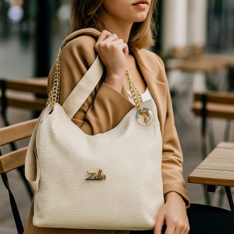   Zellia váll,- és oldaltáska anyagában mintás arany láncos bézs 