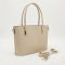 Váll,- és oldaltáska kis méretű elegáns bézs 